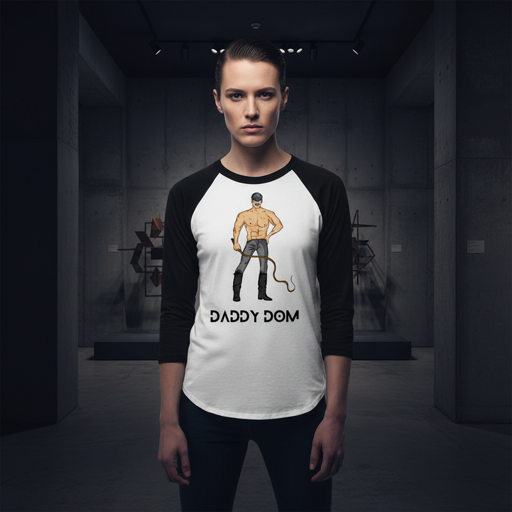 Daddy Dom 3/4 sleeve raglan shirt in black and white, shows a muscular leather daddy with whip and "DADDY DOM" text