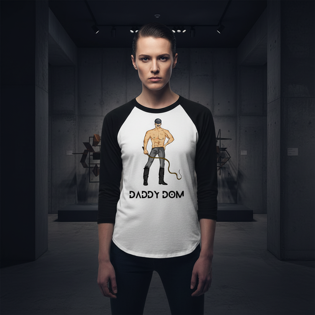 Daddy Dom 3/4 sleeve raglan shirt in black and white, shows a muscular leather daddy with whip and "DADDY DOM" text