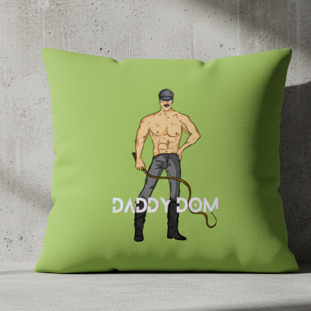 Premium green LGBT pillow with a shirtless, muscular person in boots, cap, sunglasses, holding a whip