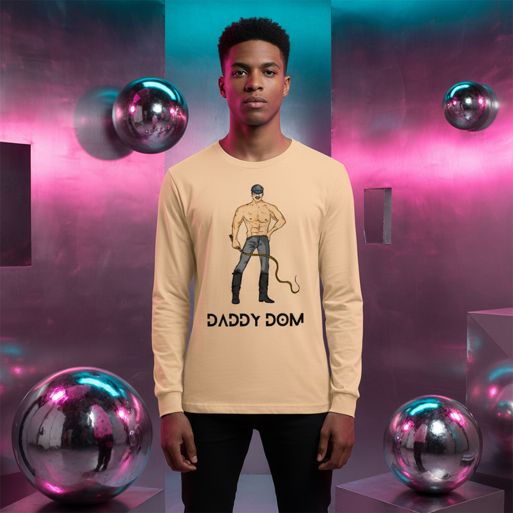 Beige Daddy Dom Unisex Long Sleeve Tee with illustrated leather daddy and "DADDY DOM" text