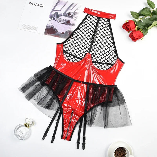 Flat lay of a red PVC bodysuit with black fishnet panels, ruffles, and straps