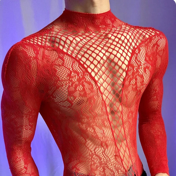 Cropped front view of a person in a sheer red lace bodysuit with long sleeves