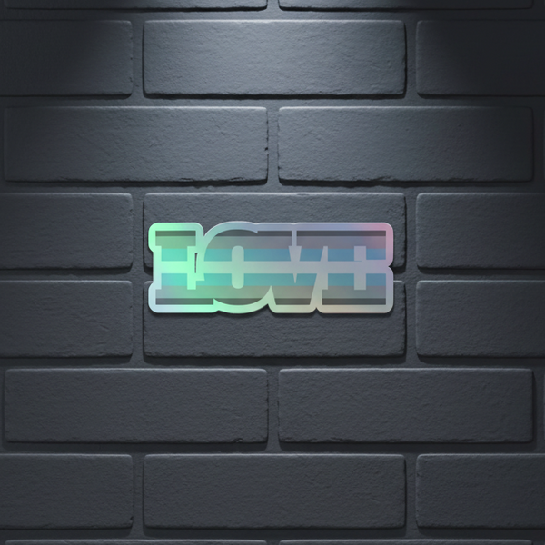Demiboy Love Holographic Stickers shimmer on a dark gray brick wall beneath a neon “LOVE” sign in soft pastel gradients.