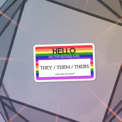 Rainbow-bordered magnet reading “Hello, my pronouns are they/them/theirs”