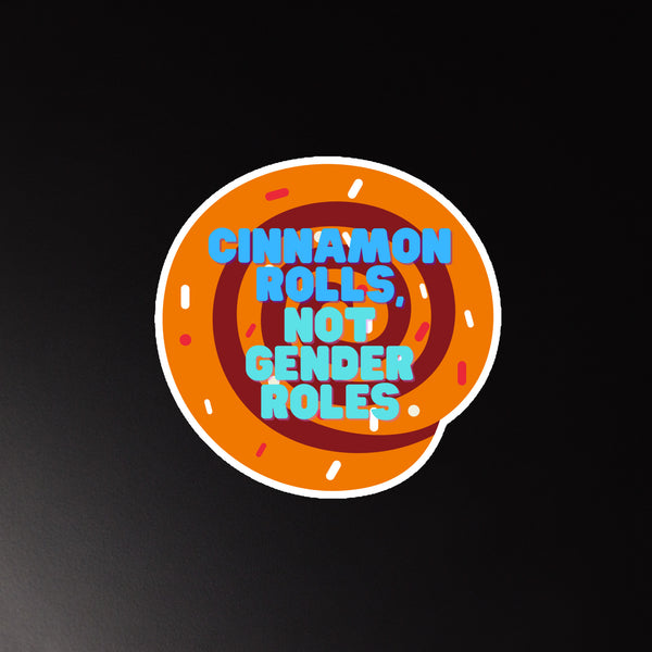 Round orange cinnamon-roll magnet reading “CINNAMON ROLLS, NOT GENDER ROLES”