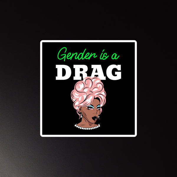 Square magnet reading “Gender is a DRAG,” with a pink-haired drag performer illustration