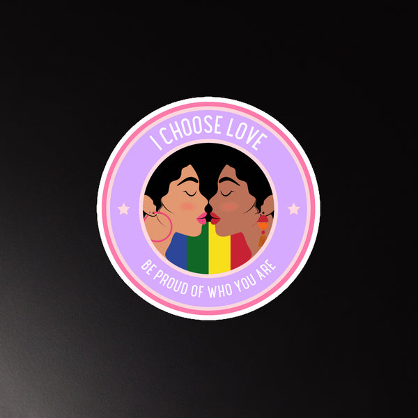 Round magnet reading “I CHOOSE LOVE” and “BE PROUD OF WHO YOU ARE,” with two women kissing