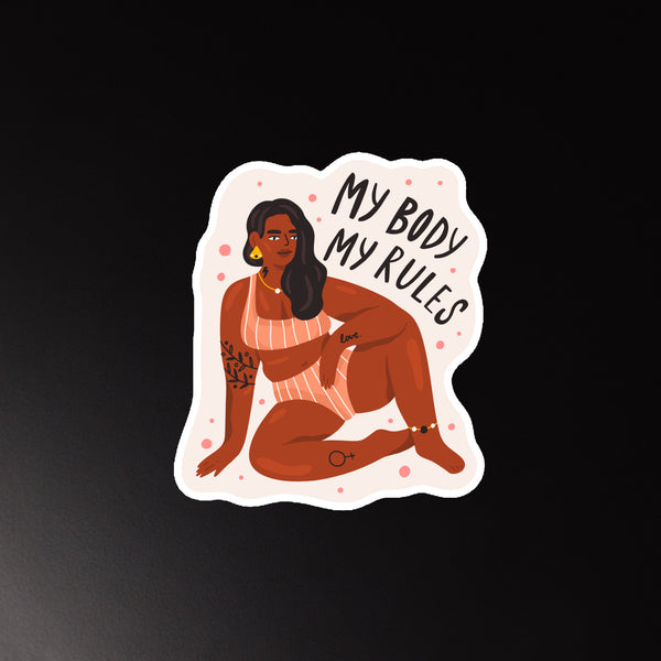 Die-cut magnet showing a seated woman and the words “My Body My Rules”