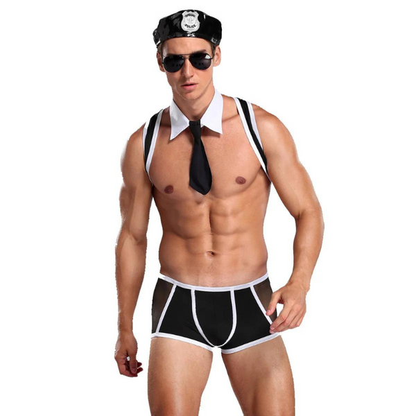 Front-facing shirtless person modeling a black police-themed costume with cap, sunglasses, tie, and briefs