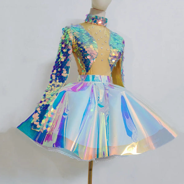 Front-view mannequin wearing a multicolor sequin crop top and iridescent flared skirt