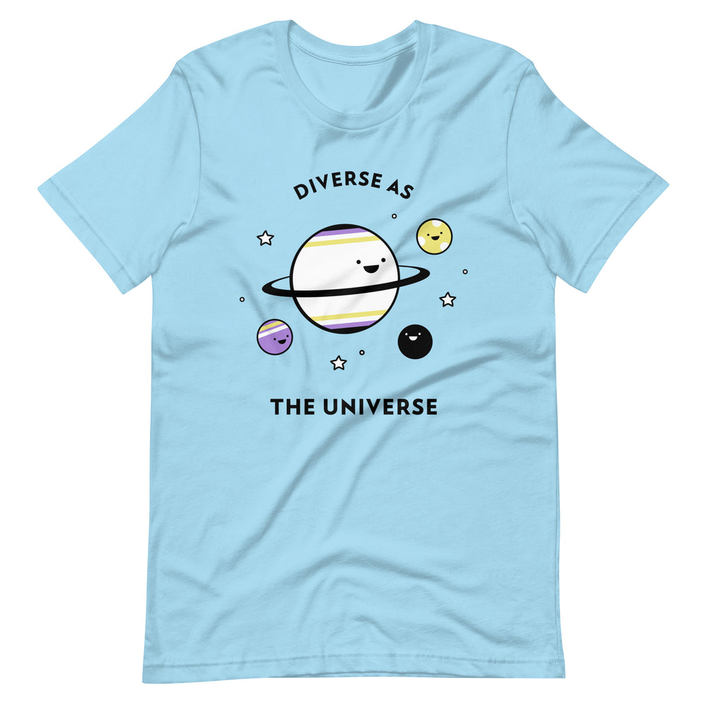 Front view of a light blue T-shirt reading “DIVERSE AS THE UNIVERSE” with smiling planets