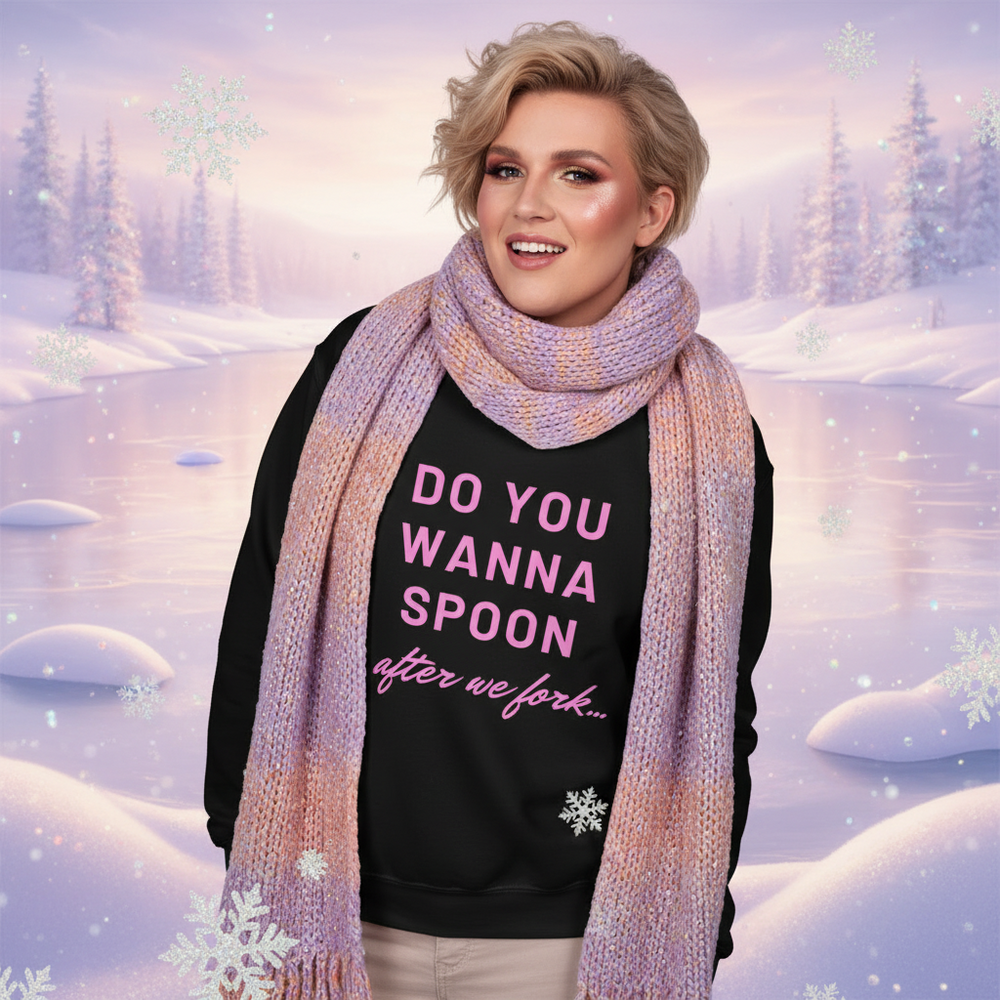 Model wearing a black sweatshirt reading “DO YOU WANNA SPOON after we fork...”