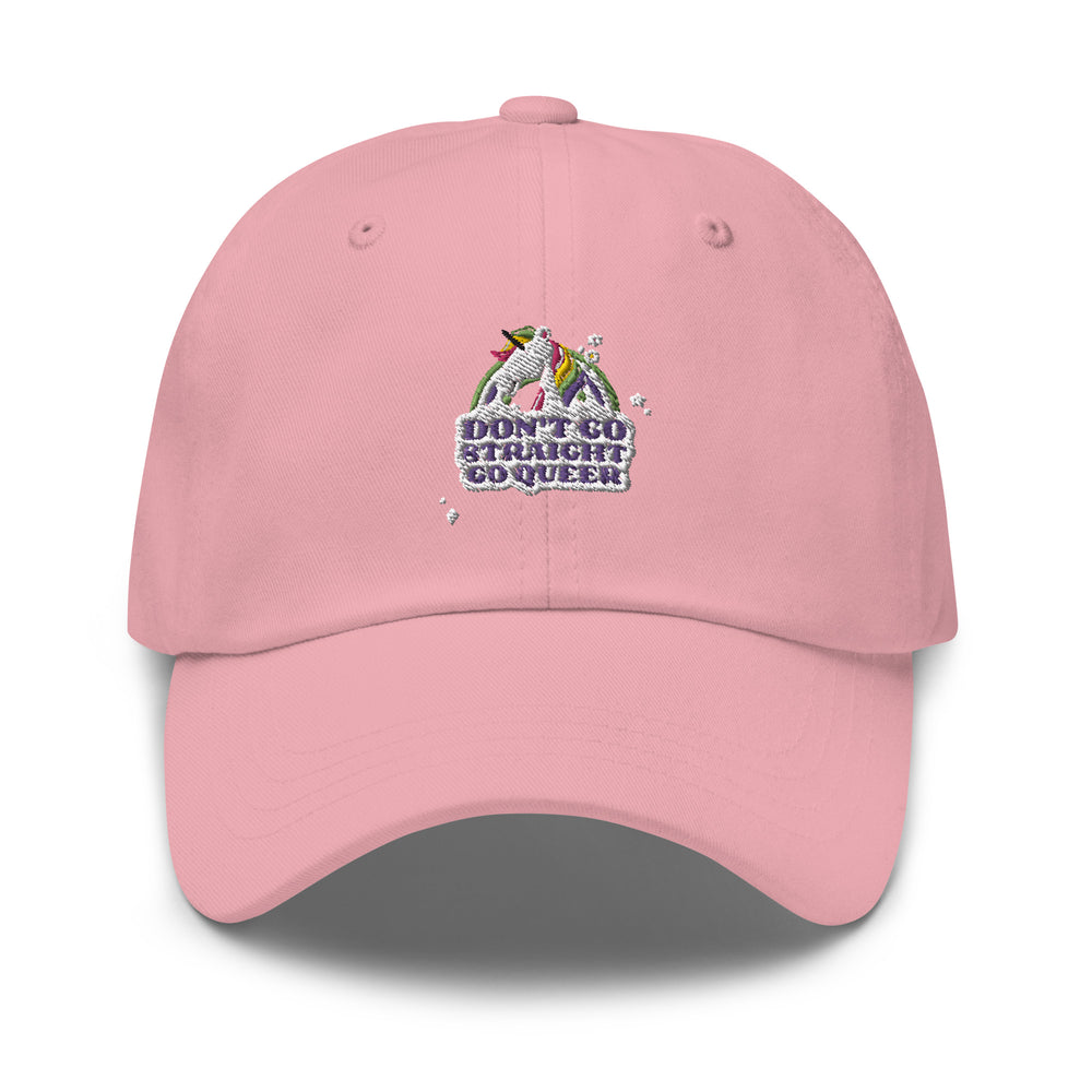 Front view of a pink cap embroidered with a rainbow and “DON’T GO STRAIGHT, GO QUEER”