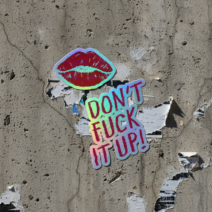 Don't Fuck It Up! holographic sticker with shiny red lips over bold rainbow text