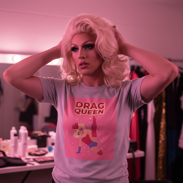 Drag Queen Unisex T-Shirt in a pink-lit dressing room, showing a cartoon drag queen and “DRAG QUEEN” text
