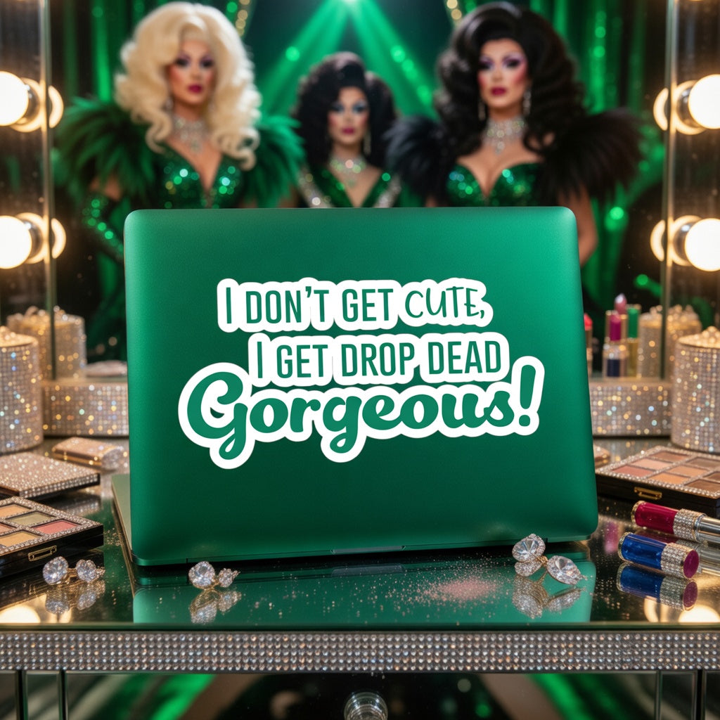 Green laptop with Drop Dead Gorgeous Bubble-Free Stickers and bold white text sits on sparkly vanity