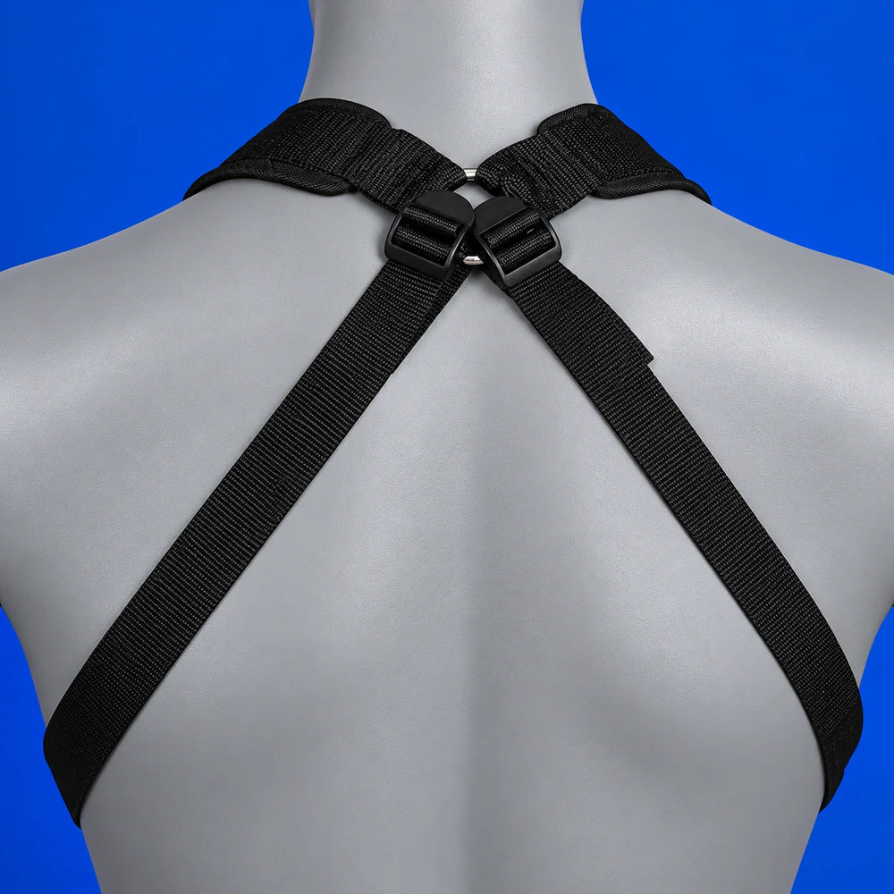 Rear upper-strap detail of the Dual Delight sling harness on a grey display bust against cobalt blue.