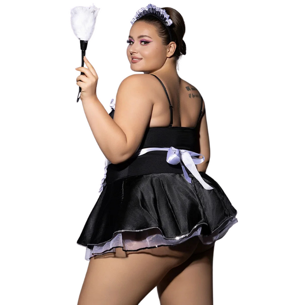 Rear three-quarter view of a person in a black maid costume holding a feather duster
