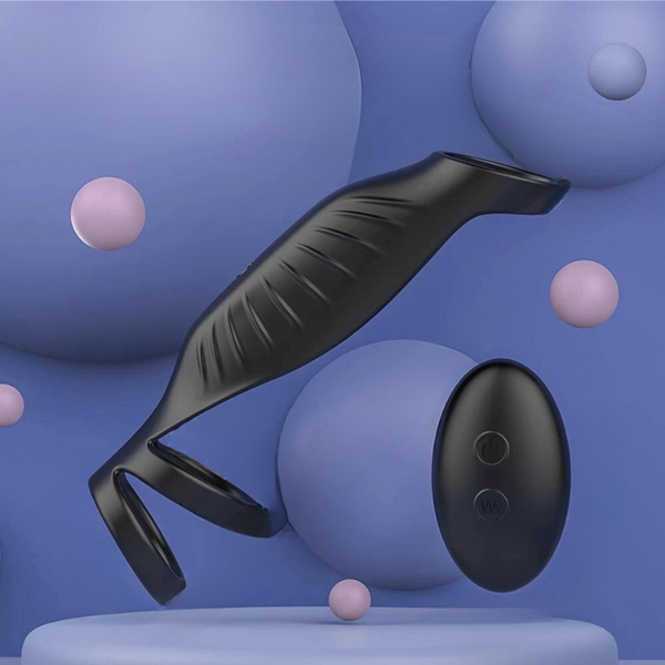 Black penis sleeve extender with ribbed shaft and separate oval remote on a blue background