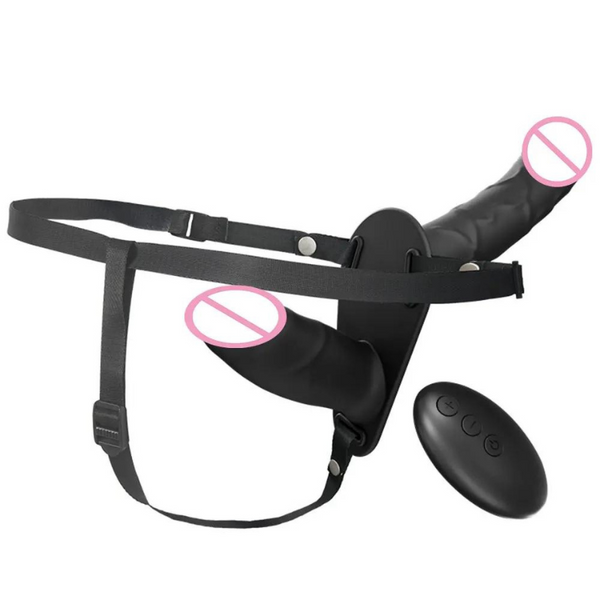 Black wearable vibrating strap-on harness with two capped attachments and a separate remote