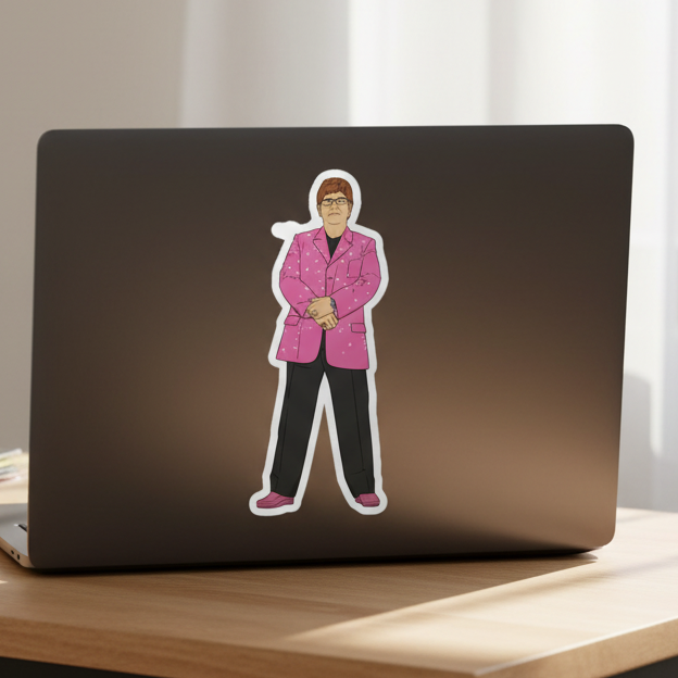 Elton John Bubble-Free Sticker on a laptop, flaunting a figure in pink blazer, black pants and glasses