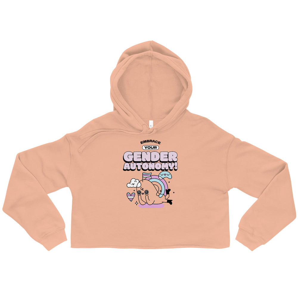 Peach cropped hoodie laid flat, reading “Embrace Your Gender Autonomy!” above a whimsical snail graphic