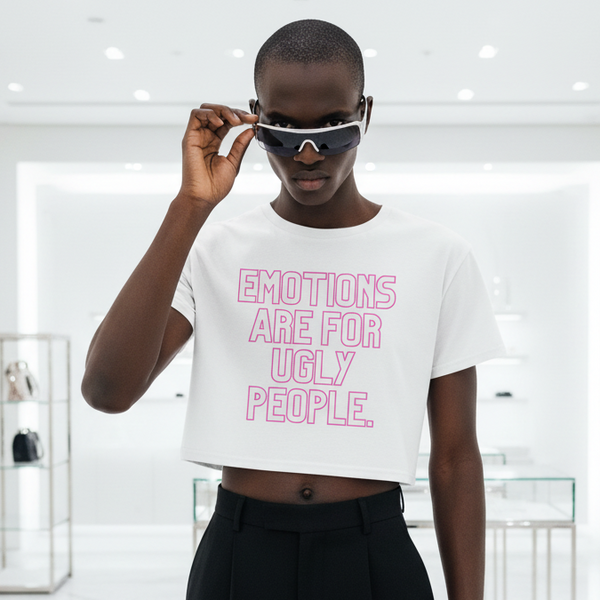 Model in a white Emotions Are For Ugly People crop top