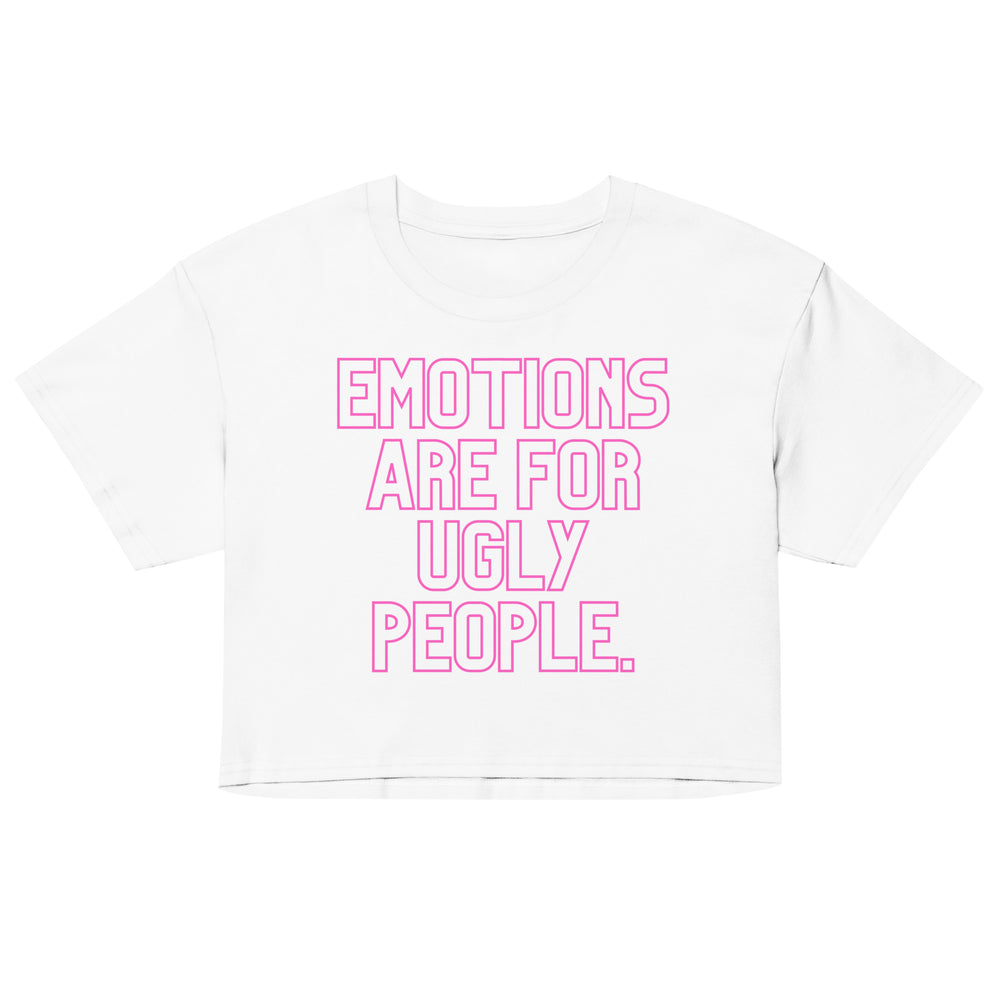 Front view of a white cropped T-shirt with pink text, “EMOTIONS ARE FOR UGLY PEOPLE.”