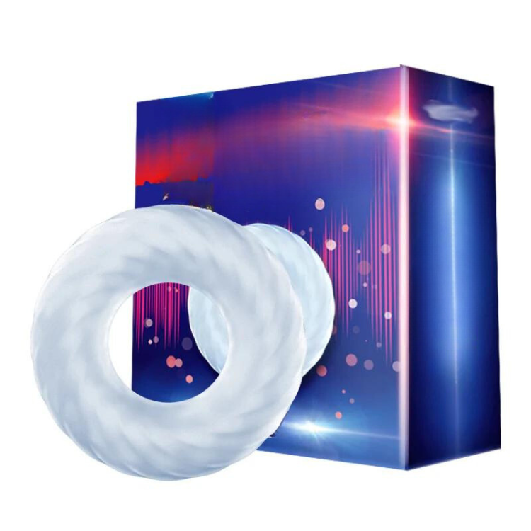 White textured silicone cock ring in front of a blue and purple product box