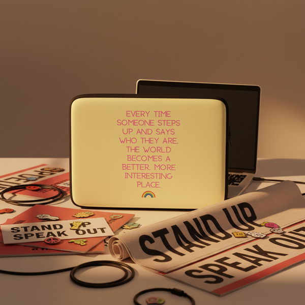 Yellow card wallet with pink quote: “Every time someone steps up and says who they are...” plus a rainbow icon