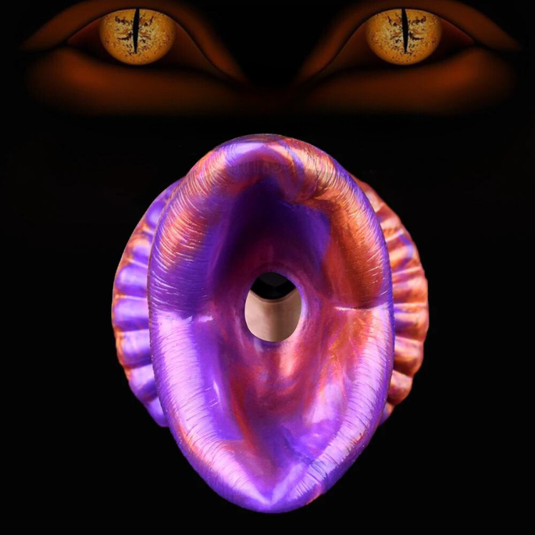 Close-up of a translucent purple, ridged fantasy demon anal plug with a central opening