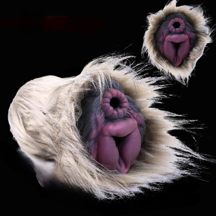 White shaggy-fur masturbator with two visible purple vulva-like openings on a black background