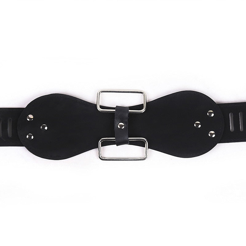 Close-up of a black leather female chastity belt with two silver buckles