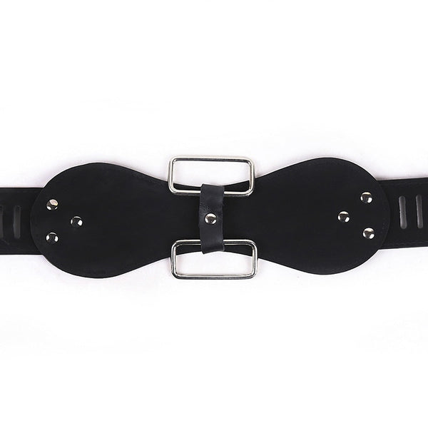 Close-up of a black leather female chastity belt with two silver buckles