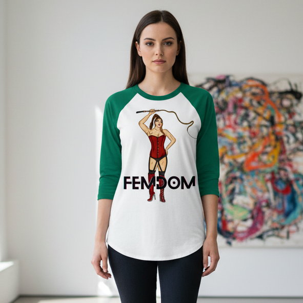 FEMDOM 3/4 sleeve raglan: white and green baseball tee, "FEMDOM" babe in red with whip, worn by a person