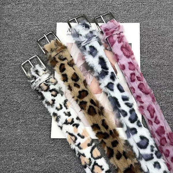 Feral cowgirl leopard faux fur belt photographed for the product listing.