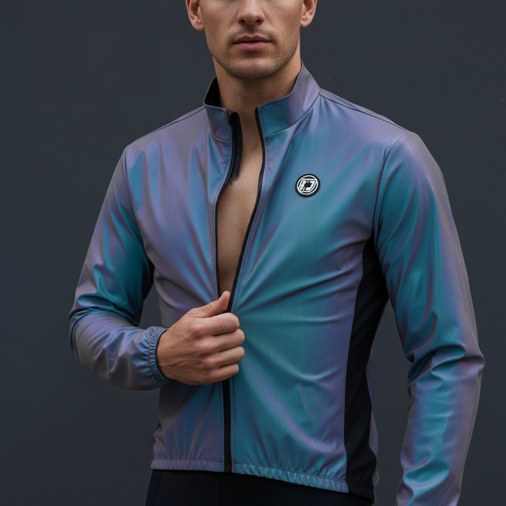 Model wearing an iridescent teal-and-purple zip-front jacket, partly unzipped