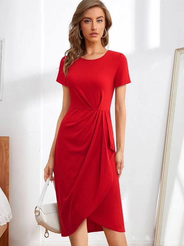 Model wearing a red short-sleeve dress with a gathered waist and asymmetrical draped hem