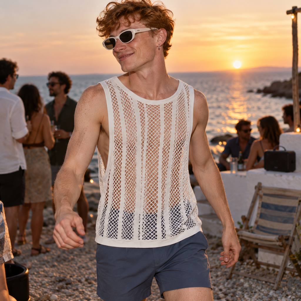 White Fishnet Sleeveless Tank Top worn with blue shorts at a sunset beach party.