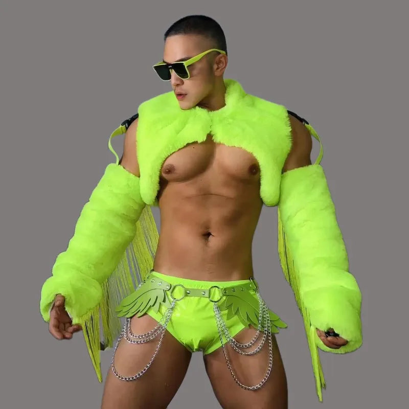 Model wearing a neon green faux-fur cropped jacket and matching chain-trimmed briefs