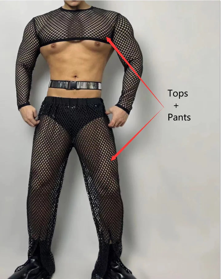 Model wearing a black fishnet crop top and matching pants with a belt