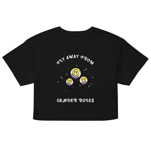 Front view of a black crop top reading “FLY AWAY FROM GENDER ROLES” with smiley balloons
