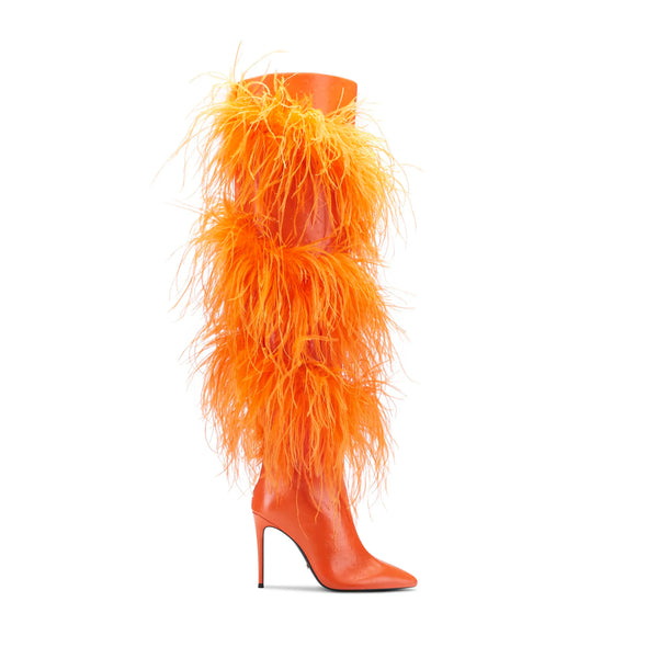 Side view of an orange knee-high stiletto boot with shaggy orange faux-fur trim
