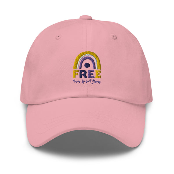 Pink embroidered baseball cap; nonbinary Pride cap with “Free To Say: Life Isn't Binary!” design; product view; front view