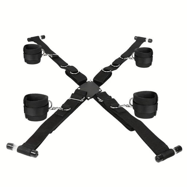 Black over-door sex sling laid flat, with four padded cuffs and crossed adjustable straps