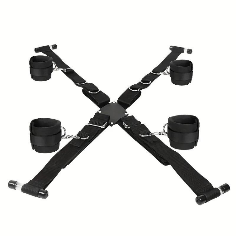 Black over-door sex sling laid flat, with four padded cuffs and crossed adjustable straps