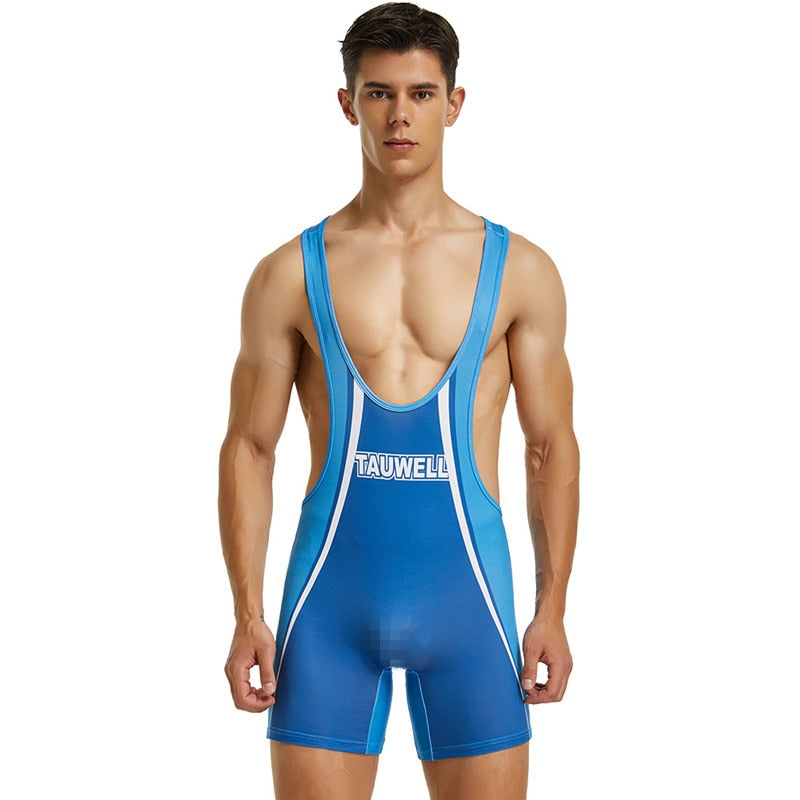 Front-facing model wearing a blue athletic bodysuit with white trim and “TAUWELL” text