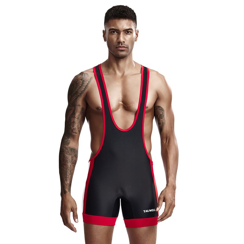 Front-view model wearing a black wrestling singlet with red trim and deep scoop neck
