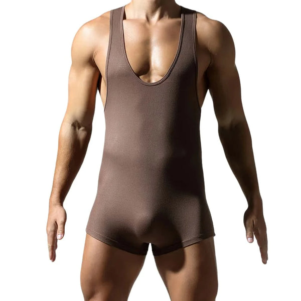 Front view of a muscular model wearing a brown ribbed compression bodysuit