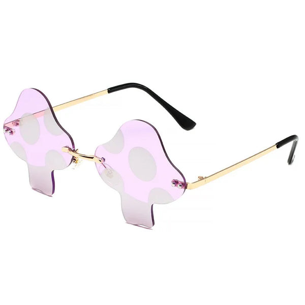 Angled view of pink mushroom-shaped rimless sunglasses with gold arms and black earpieces